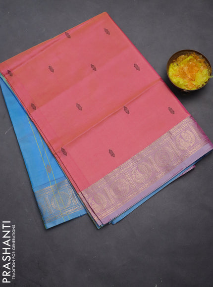 Banana pith saree dual shade of pinkish orange and light blue with thread woven buttas and zari woven border