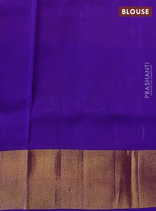 Pure uppada silk saree dual shade of pink and blue with allover zari woven thilak buttas and floral design zari woven border