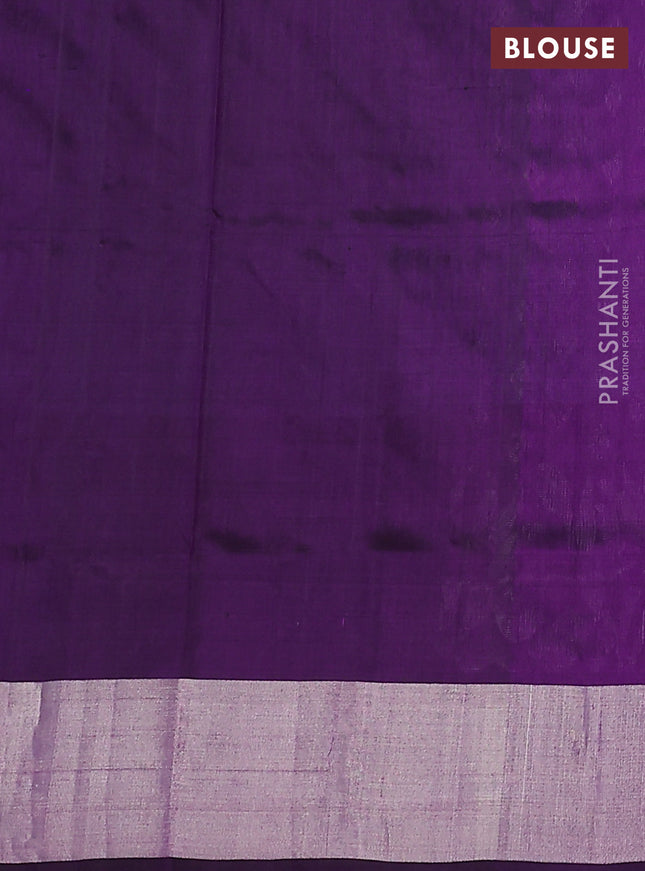 Pure uppada silk saree dual shade of blue and deep purple with allover silver zari woven buttas and floral design silver zari woven border