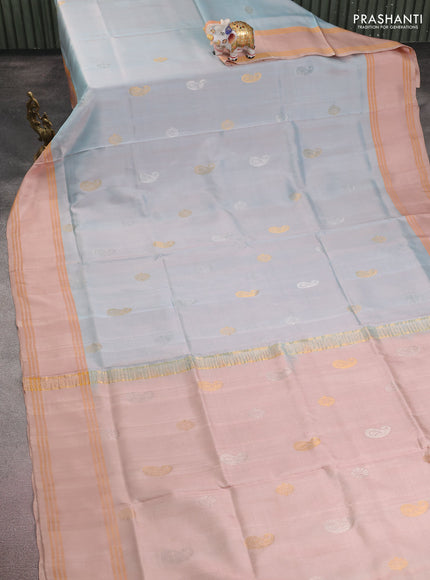 Pure uppada silk saree pastel blue shade and sandal with silver & gold zari woven buttas and rettapet zari woven border