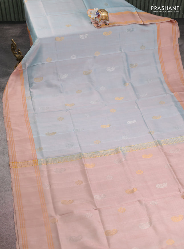 Pure uppada silk saree pastel blue shade and sandal with silver & gold zari woven buttas and rettapet zari woven border
