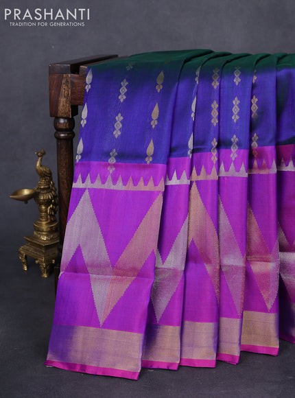 Pure uppada silk saree dual shade of bluish green and purple with allover silver & gold zari buttas and long zari woven border