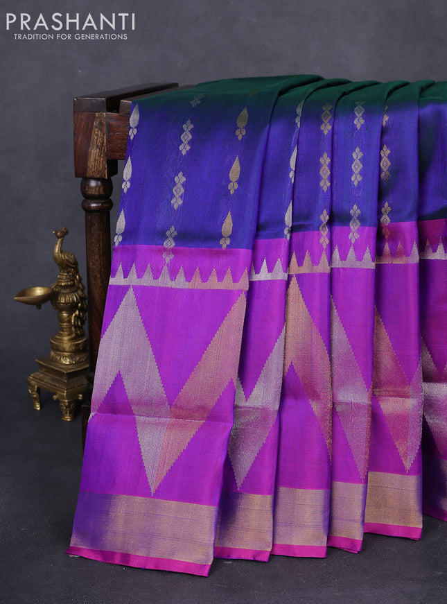 Pure uppada silk saree dual shade of bluish green and purple with allover silver & gold zari buttas and long zari woven border