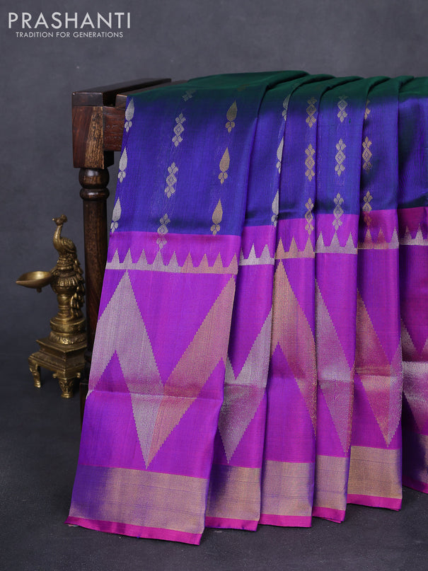 Pure uppada silk saree dual shade of bluish green and purple with allover silver & gold zari buttas and long zari woven border