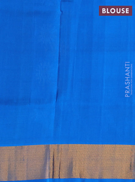Pure uppada silk saree black and cs blue with silver & gold zari woven buttas and zari woven border