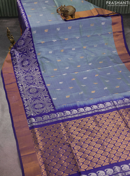 Pure uppada silk saree dual shade of pastel blue and dark blue with silver & gold zari woven buttas and long zari wovenn border