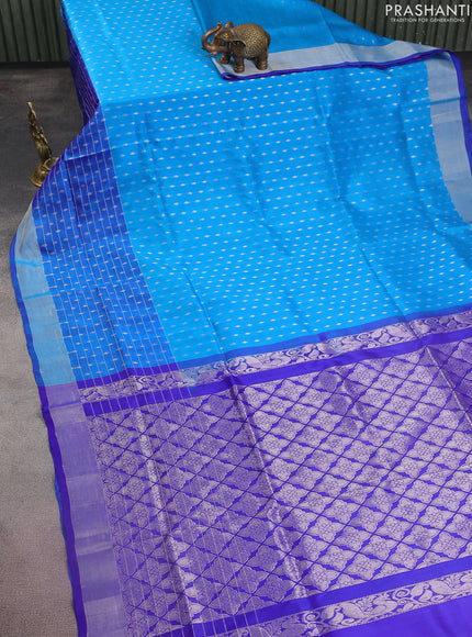 Pure uppada silk saree cs blue and blue with allover silver zari buttas and long silver zari woven border