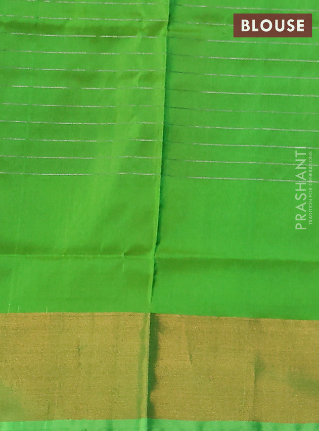 Pure uppada silk saree purple and light green with allover silver zari checks & buttas and zari woven border