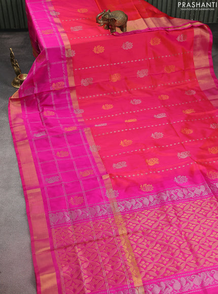Pure uppada silk saree dual shade of pinkish orange and pink with silver & gold zari weaves & buttas and long zari checked border