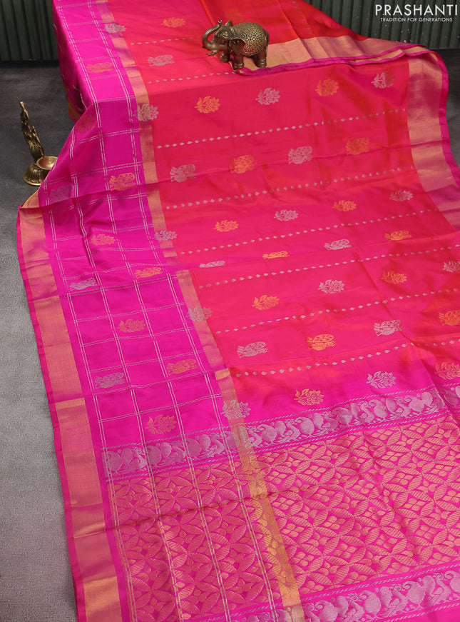 Pure uppada silk saree dual shade of pinkish orange and pink with silver & gold zari weaves & buttas and long zari checked border