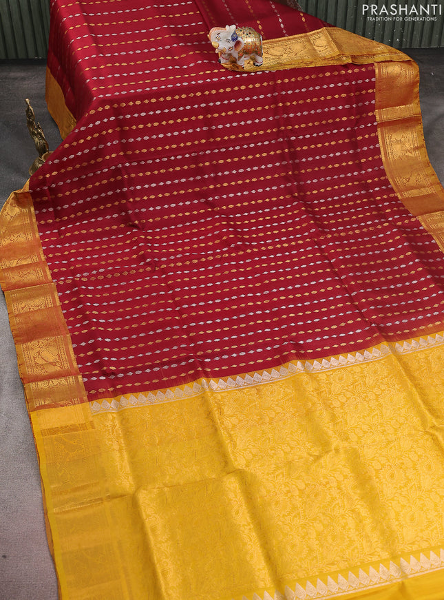 Pure uppada silk saree maroon and yellow with allover silver & gold zari woven buttas and zari woven border