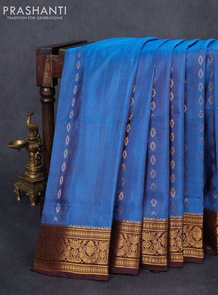 Pure uppada silk saree cs blue and brown with allover silver & gold zari woven buttas and zari woven border