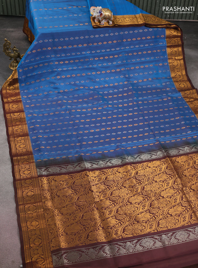 Pure uppada silk saree cs blue and brown with allover silver & gold zari woven buttas and zari woven border