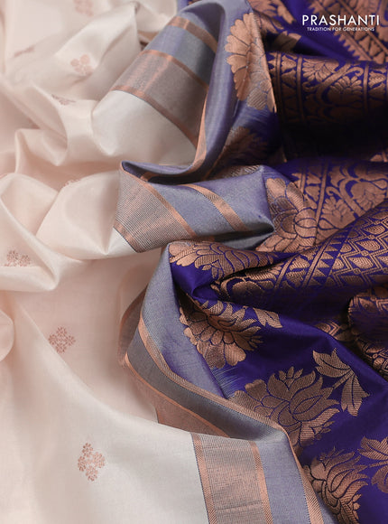 Pure gadwal silk saree cream and blue with zari woven buttas and temple design embroidery border