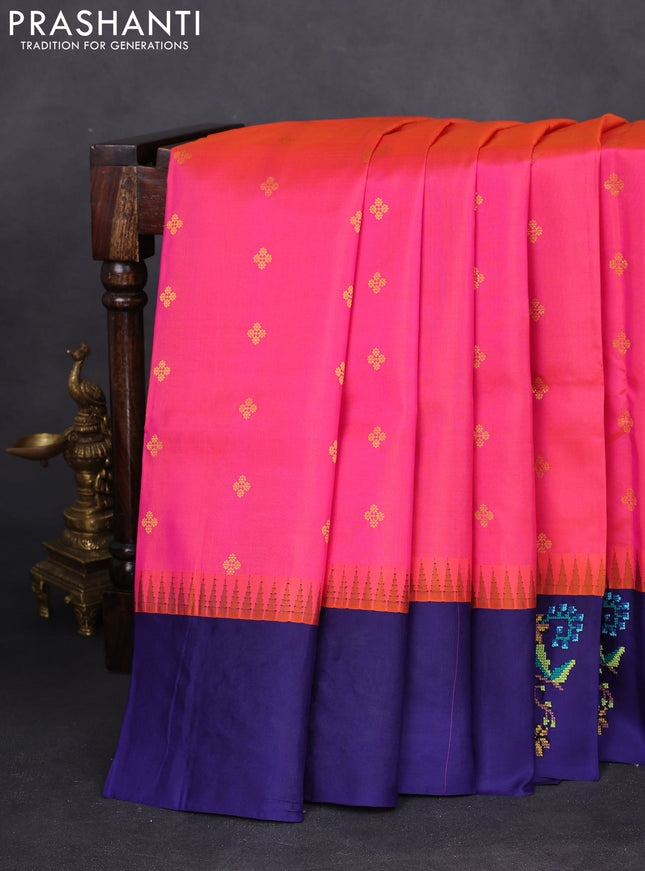 Pure gadwal silk saree dual shade of pinkish orange and blue with zari woven buttas and temple design embroidery border
