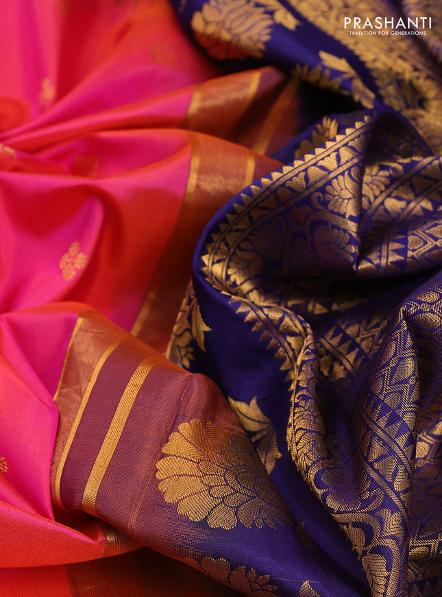 Pure gadwal silk saree dual shade of pinkish orange and blue with zari woven buttas and temple design embroidery border