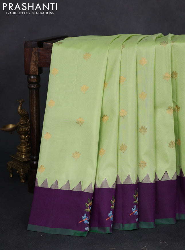 Pure gadwal silk saree pista green and deep purple with zari woven buttas and temple design embroidery border