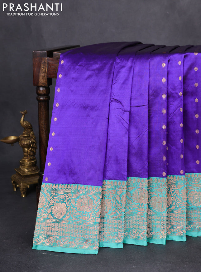 Banarasi katan silk saree blue and teal green shade with allover zari woven buttas and floral zari woven border