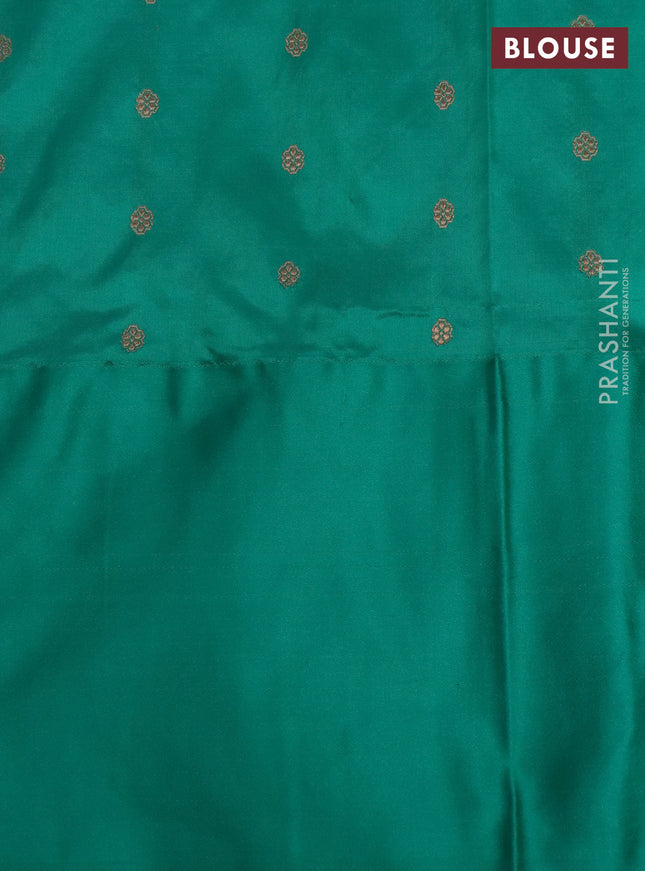 Banarasi katan silk saree blue and teal green shade with allover zari woven buttas and floral zari woven border