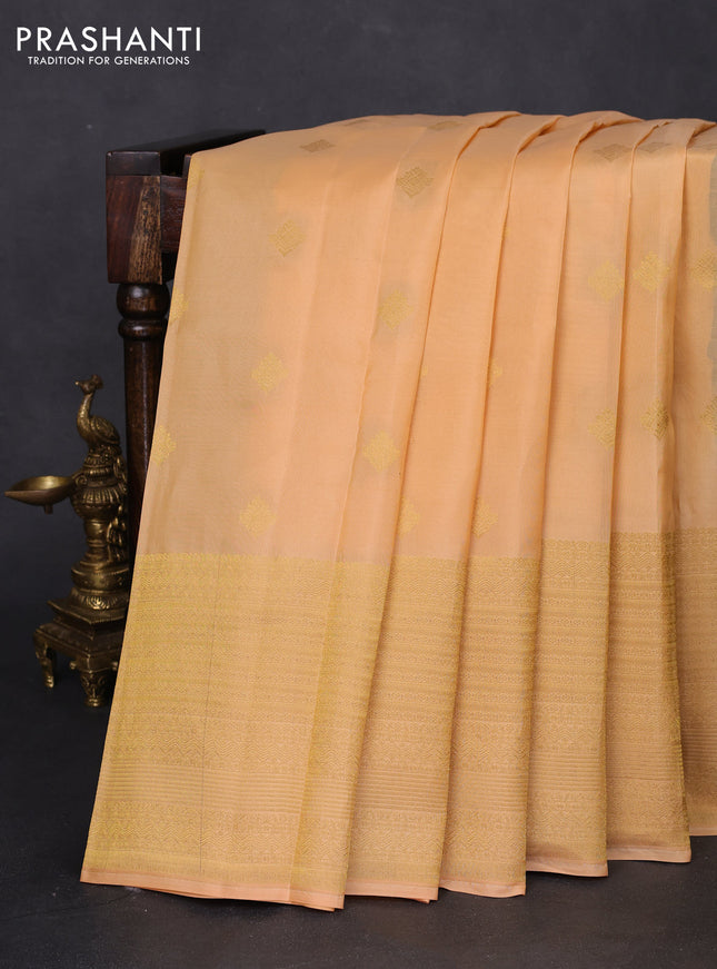 Kanchipuram silk saree sandal and bottle green with zari woven buttas and long zari woven border