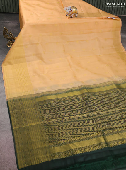 Kanchipuram silk saree sandal and bottle green with zari woven buttas and long zari woven border