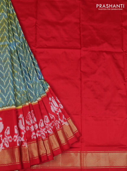 Ikat silk kids lehenga teal blue and red with allover ikat weaves and long ikat woven zari border