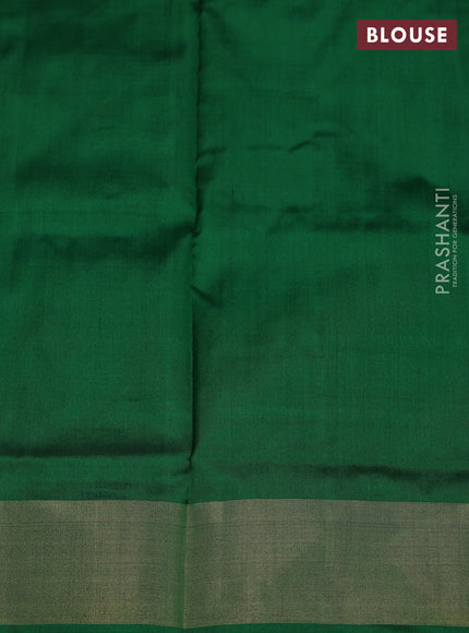 Ikat silk kids lehenga pink and green with allover ikat weaves and long ikat woven zari border