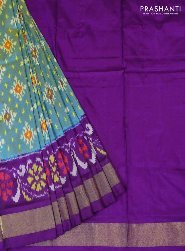 Ikat silk kids lehenga teal blue and violet with allover ikat weaves and long ikat woven zari border