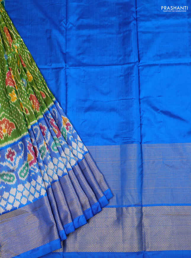 Ikat silk kids lehenga light green and cs blue with allover ikat weaves and long ikat woven zari border