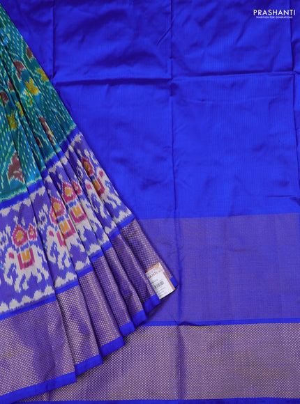 Ikat silk kids lehenga teal blue and royal blue with allover ikat weaves and long ikat woven zari border