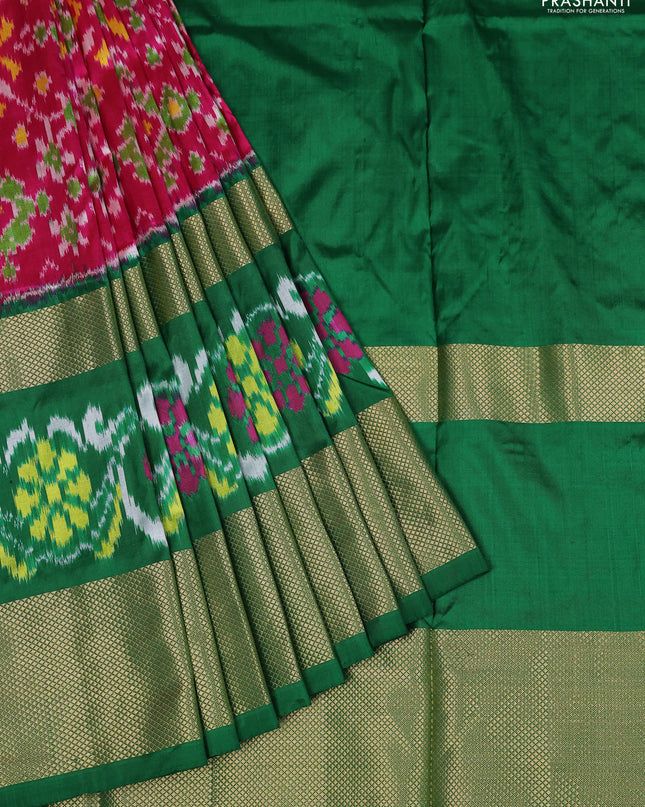 Ikat silk kids lehenga pink and green with allover ikat weaves and long ikat woven zari border