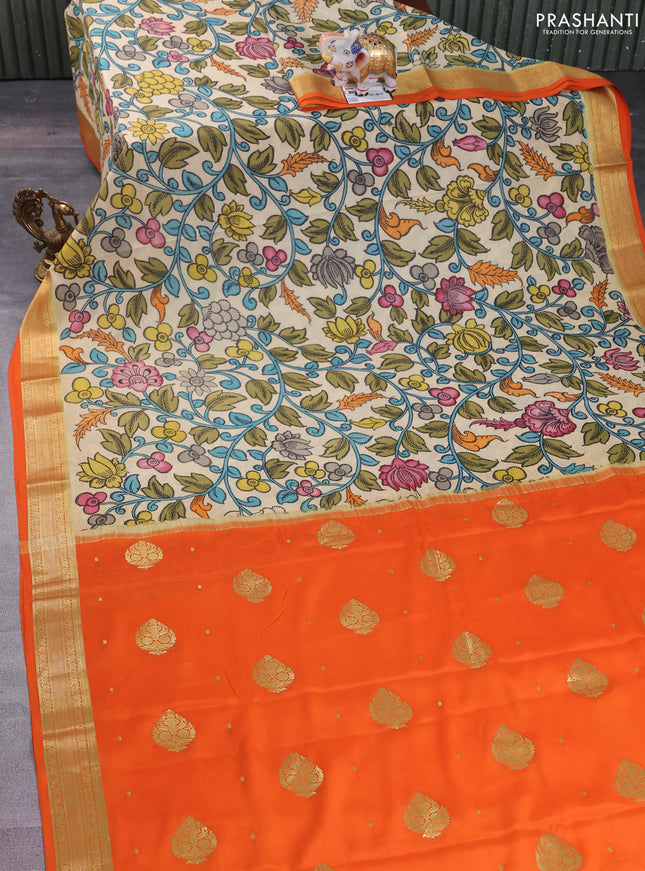 Pure mysore silk saree cream and orange with allover pen kalamkari prints and zari woven border