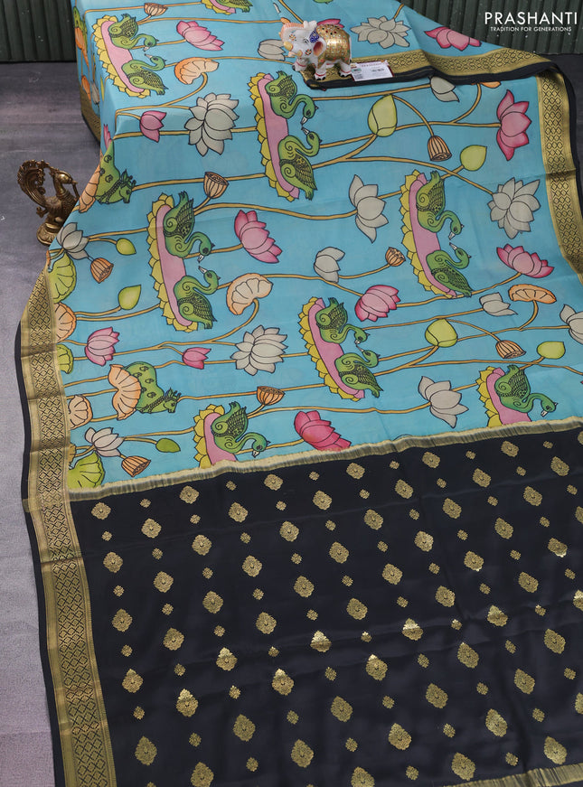 Pure mysore silk saree teal blue and black with allover pen kalamkari prints and zari woven border