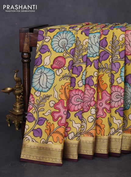 Pure mysore silk saree pale yellow and deep maroon with allover pen kalamkari prints and zari woven border