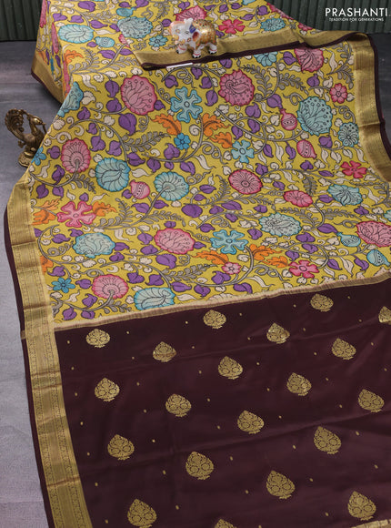 Pure mysore silk saree pale yellow and deep maroon with allover pen kalamkari prints and zari woven border