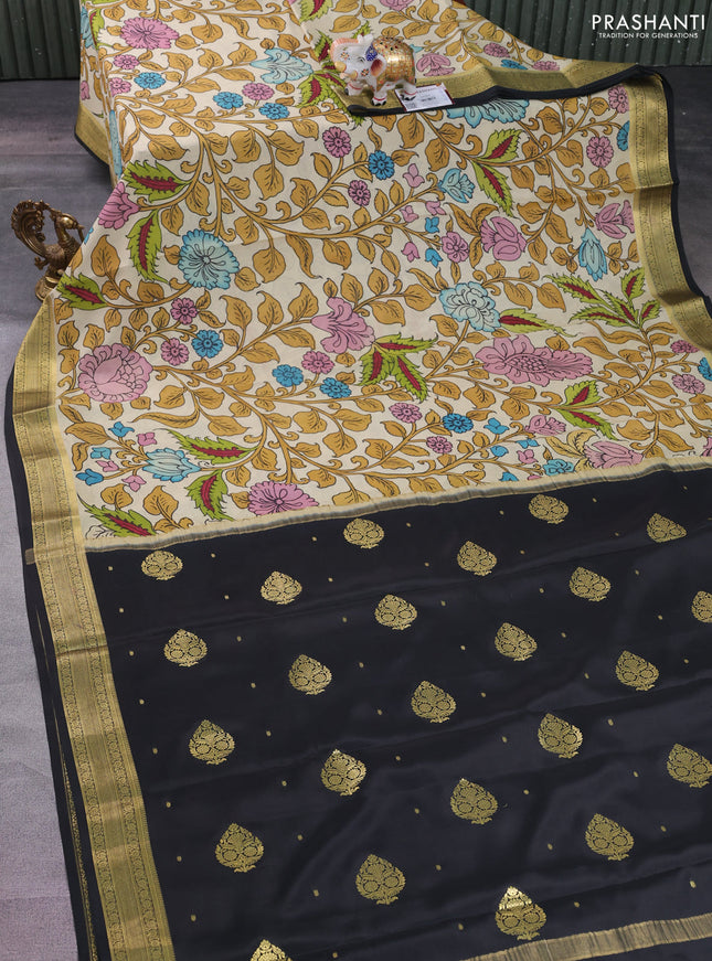 Pure mysore silk saree cream and black with allover pen kalamkari prints and zari woven border