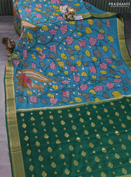 Pure mysore silk saree teal blue and green with allover pen kalamkari prints and zari woven border