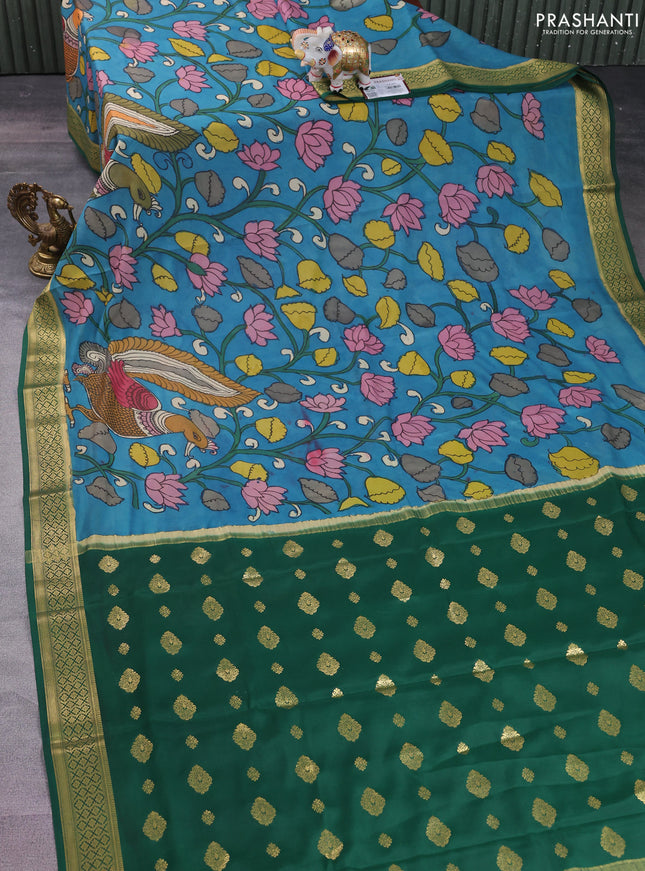 Pure mysore silk saree teal blue and green with allover pen kalamkari prints and zari woven border