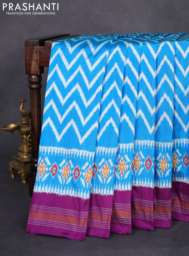 Pochampally silk saree cs blue and purple with allover zig zag ikat weaves and long ikat woven border