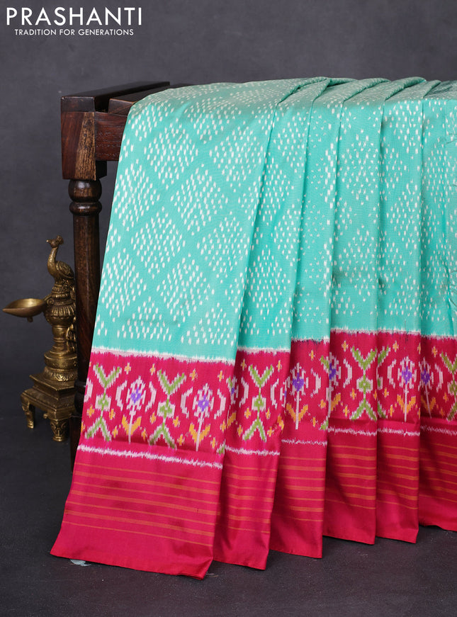 Pochampally silk saree teal green shade and pink with allover ikat weaves and long ikat woven simple border