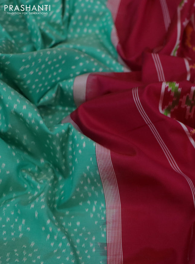 Pochampally silk saree teal green shade and pink with allover ikat weaves and long ikat woven simple border