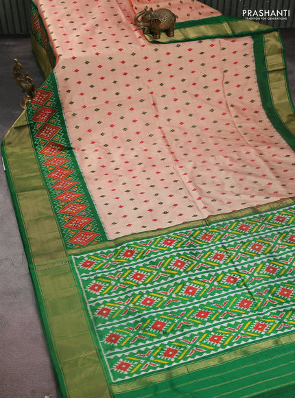 Pochampally silk saree dual shade of pale orange with allover ikat butta weaves and long ikat woven zari border