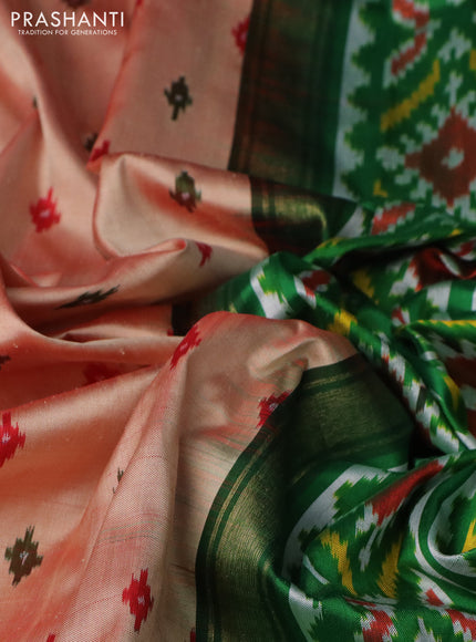Pochampally silk saree dual shade of pale orange with allover ikat butta weaves and long ikat woven zari border