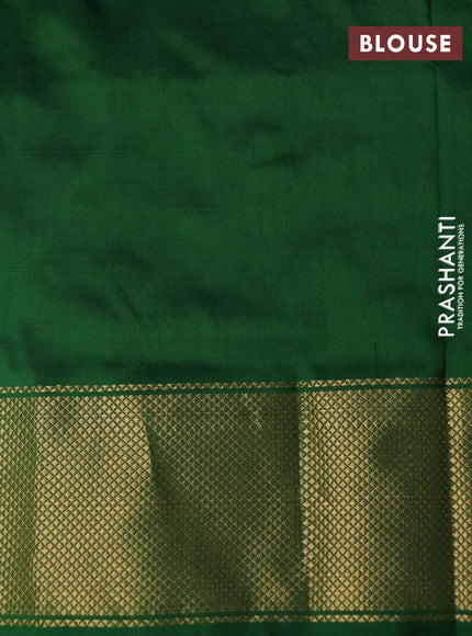 Pochampally silk saree dual shade of pale orange with allover ikat butta weaves and long ikat woven zari border