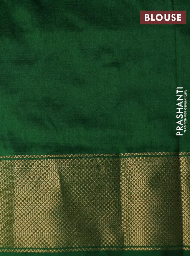 Pochampally silk saree dual shade of pale orange with allover ikat butta weaves and long ikat woven zari border