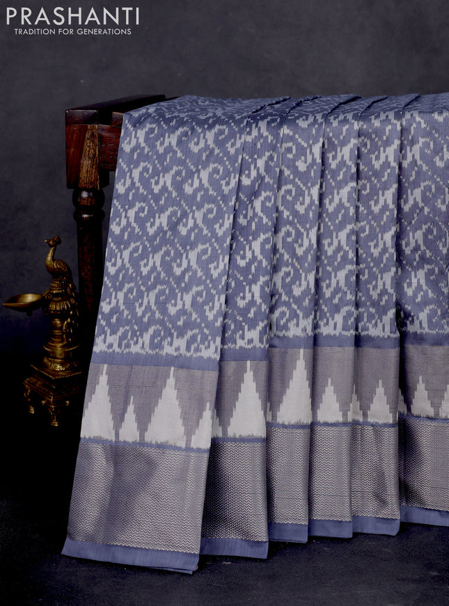 Pochampally silk saree grey with allover ikat weaves and long ikat woven silver zari border