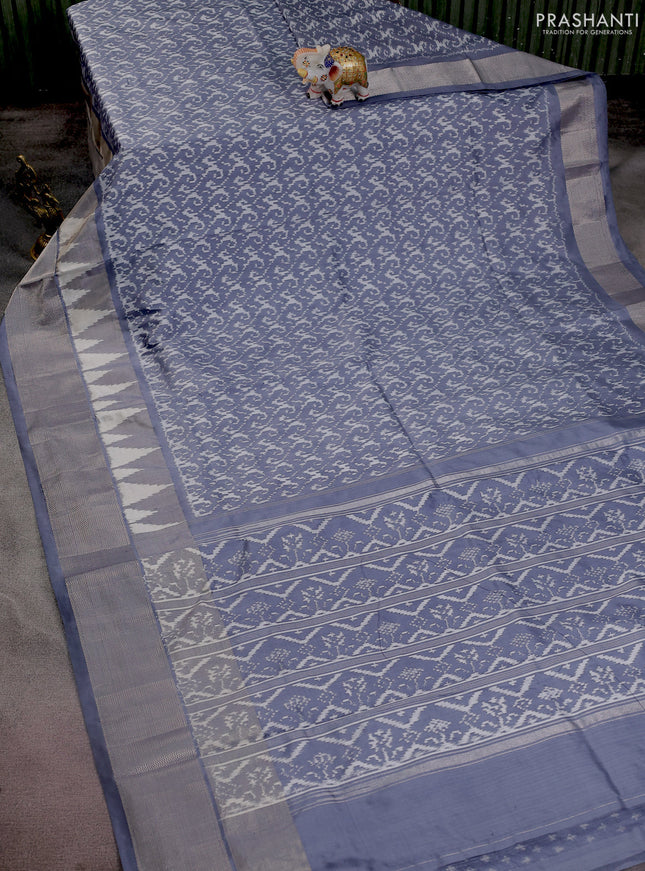 Pochampally silk saree grey with allover ikat weaves and long ikat woven silver zari border