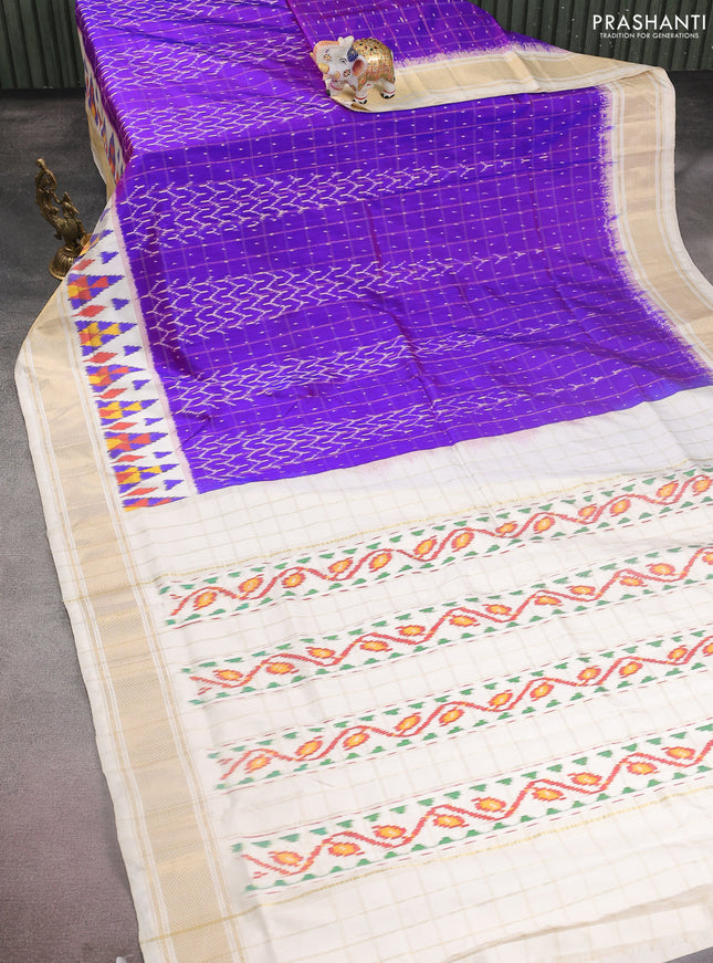 Pochampally silk saree purple and off white with allover zari checks & ikat weaves and long ikat woven zari border