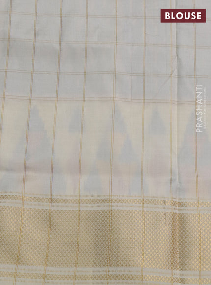 Pochampally silk saree purple and off white with allover zari checks & ikat weaves and long ikat woven zari border