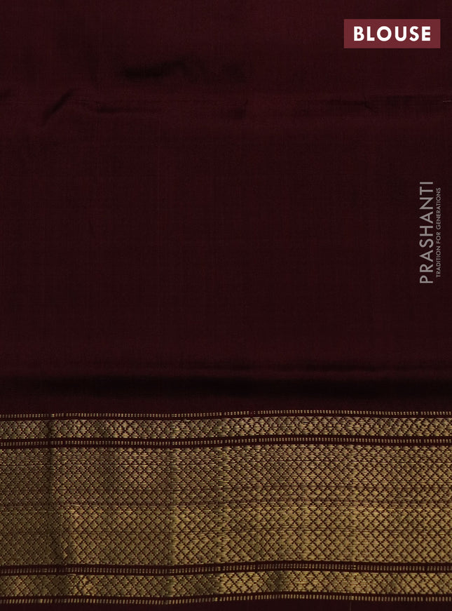 Pochampally silk saree pink and deep maroon with allover ikat weaves and long ikat woven zari border